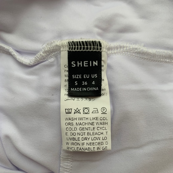 3/$35 white sports skirt with built in shorts (size s) - Picture 4 of 5